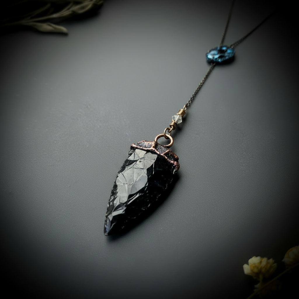 Arrowhead close-up - pure black obsidian