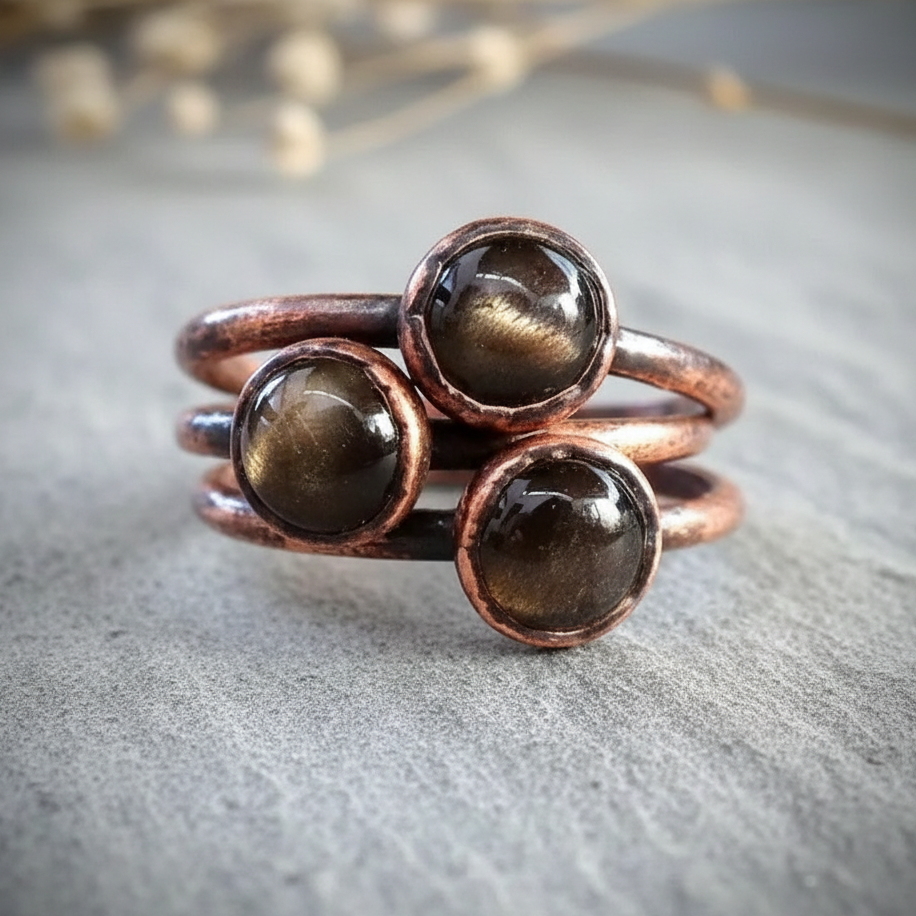 Black moonstone triple cluster on light grey slate