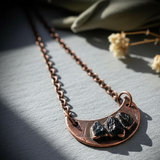 Black Tourmaline Crescent Moon Necklace Hero Flat Lay