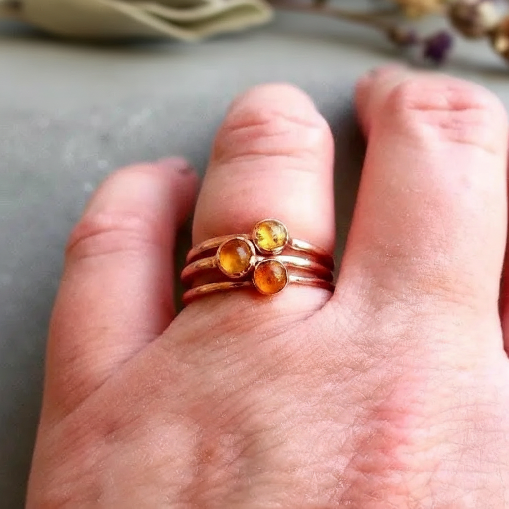 Cabochon Amber Rings Hand Shot 2