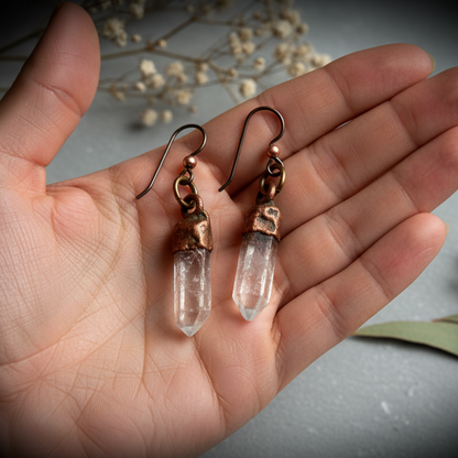 Clear Quartz Point Earrings — Hand Shot