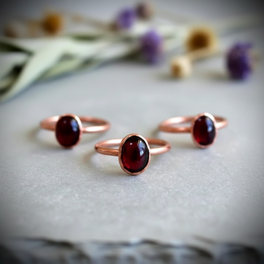 Garnet Rings — Bright Copper Group on Slate
