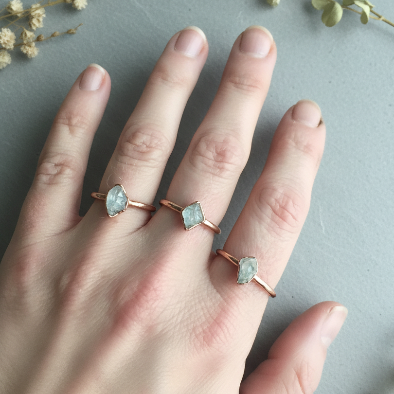 Herkimer Diamond Rings Hand Shot - Slate Surface