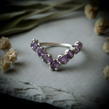 Raw amethyst silver-plated chevron ring side angle on light grey slate