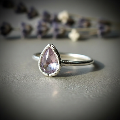 Lavender amethyst silver ring flat lay on slate with dried lavender and white wildflowers
