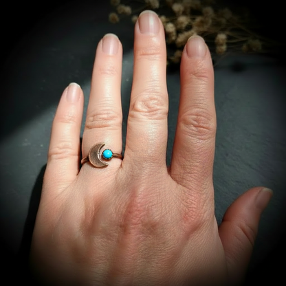 Turquoise crescent moon ring electroformed copper hand shot on dark slate