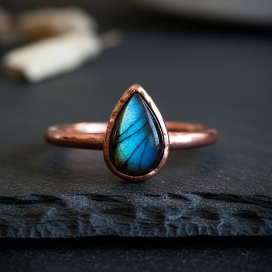 Labradorite hero flat lay on dark charcoal slate