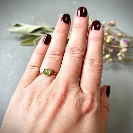 Raw Peridot Ring Hand Shot Corrected Scale