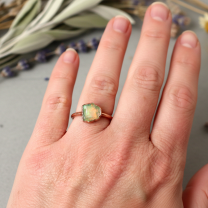 Raw Welo Opal Ring Hand Shot