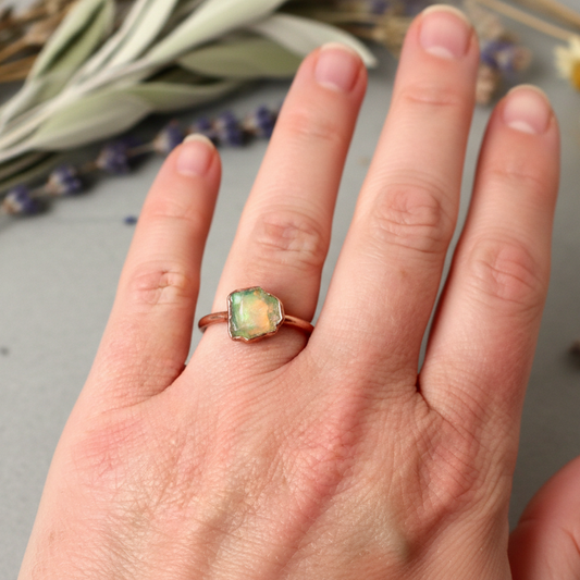 Raw Welo Opal Ring Hand Shot