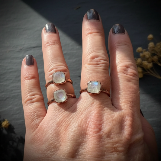 RTS cushion moonstone hand shot — brand enhanced