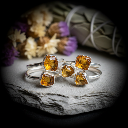 Stacked cluster of silver citrine rings