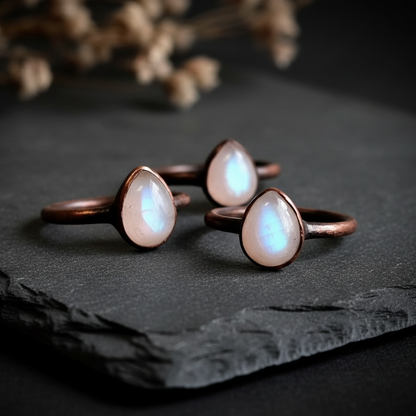 Teardrop moonstone antique copper slate flat lay