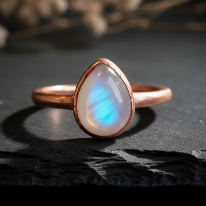 Teardrop moonstone hero close-up on dark slate